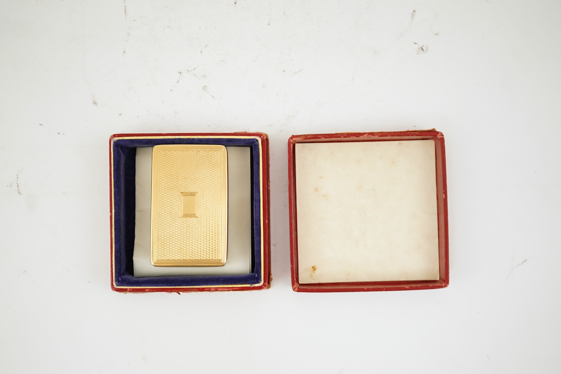 An Edwardian engine turned 18ct gold rectangular snuff box, by Joseph Walton